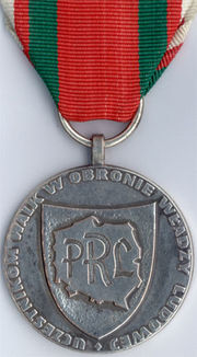 odznaki II wojna Światowa - 180px-Medal_za_Udział_w_Walkach_w_Obronie_Polski_Ludowej-rewers.jpg